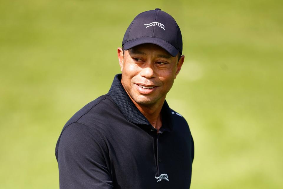 PACIFIC PALISADES, CALIFORNIA - FEBRUARY 13: Tiger Woods of the United States looks on as he practices prior to The Genesis Invitational at Riviera Country Club on February 13, 2024 in Pacific Palisades, California. (Photo by Ronald Martinez/Getty Images)