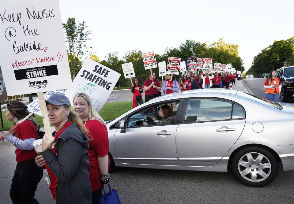 Nurses strike Monday, Sept. 12, 2022 outside North Memorial Health Hospital in Robbinsdale, Minn. Nurses launched a three-day strike over issues of pay and what they say is understaffing that has been worsened by the strains of the coronavirus pandemic. (David Joles/Star Tribune via AP)
