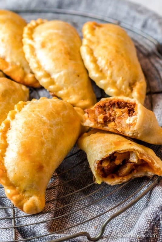 <p>Flavor Mosaic</p><p> Stuffed with spicy chorizo and potato filling, wrapped in a buttery, golden, flaky pastry.</p><p><strong>Get the recipe: </strong><a href="https://flavormosaic.com/potato-and-chorizo-empanadas/" rel="nofollow noopener" target="_blank" data-ylk="slk:Potato and Chorizo Empanadas;elm:context_link;itc:0;sec:content-canvas" class="link rapid-noclick-resp">Potato and Chorizo Empanadas</a></p>