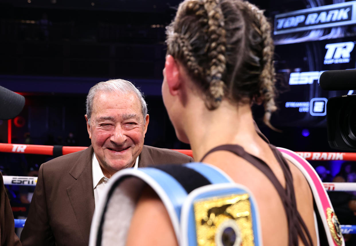 LAS VEGAS, NEVADA - NOVEMBER 05: Bob Arum (L) greets Mikaela Mayer (R) after Mikaela's victory over Maiva Hamadouche for the WBO & IBF female super featherweight championship at Virgin Hotels Las Vegas on November 05, 2021 in Las Vegas, Nevada.(Photo by Mikey Williams/Top Rank Inc via Getty Images)