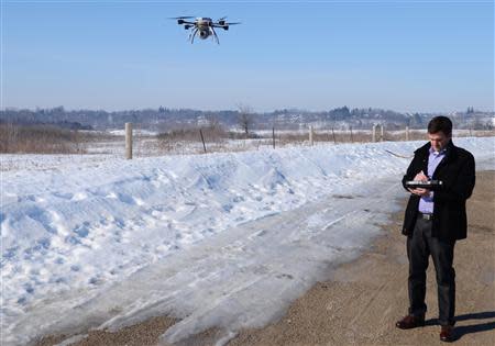 Ian McDonald, Aeryon Labs' VP of product marketing pilots the drone Aeryon Scout used by public safety, commercial and industrial users to reliably collect high quality aerial imagery and data in Waterloo, Ontario, March 11, 2014. REUTERS/Euan Rocha