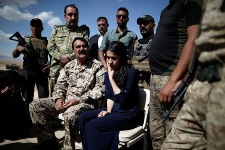 Yazidi survivor and United Nations Goodwill Ambassador for the Dignity of Survivors of Human trafficking Nadia Murad (C) reacts as she visits her village for the first time after being captured and sold as a slave by the Islamic State three years ago, in Kojo, Iraq June 1, 2017. REUTERS/Alkis Konstantinidis