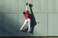 Boston Red Sox's Alex Verdugo cannot get to a baseball game-tying inside-the-park home run by Tampa Bay Rays' Austin Meadows during the ninth inning Monday, Sept. 6, 2021, at Fenway Park in Boston. (AP Photo/Winslow Townson)