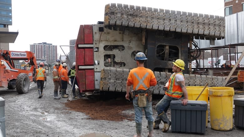 Construction crane topples at LRT tunnel entrance