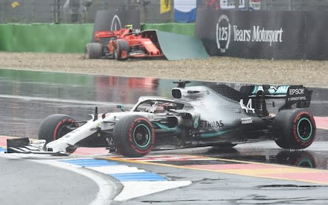 Mercedes' British driver Lewis Hamilton (Front) and Ferrari's Monegasque driver Charles Leclerc crush during the German Formula One Grand Prix at the Hockenheim - Credit: AFP