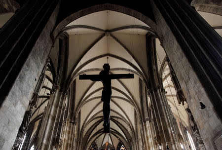 FILE PHOTO: A crucifix is seen in St. Stephens cathedral (Stephansdom) in Vienna March 18, 2010. REUTERS/Leonhard Foeger/File Photo