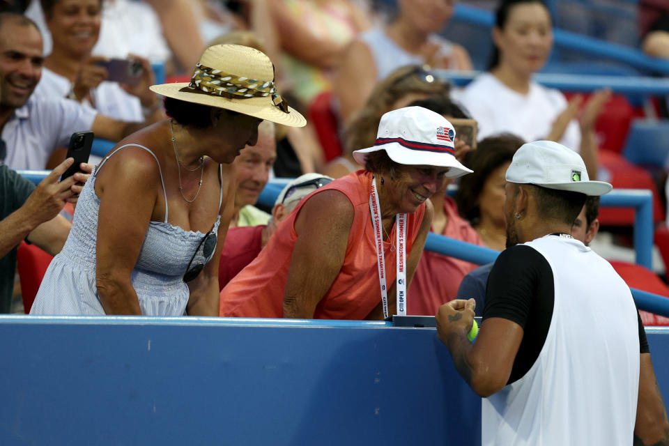 Nick Kyrgios, pictured here talking with fans before serving on match point against Marcos Giron.