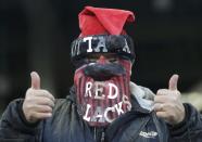 An Ottawa Redblacks fan celebrates before the CFL's 103rd Grey Cup championship football game between the Redblacks and the Edmonton Eskimos in Winnipeg, Manitoba, November 29, 2015. REUTERS/Lyle Stafford