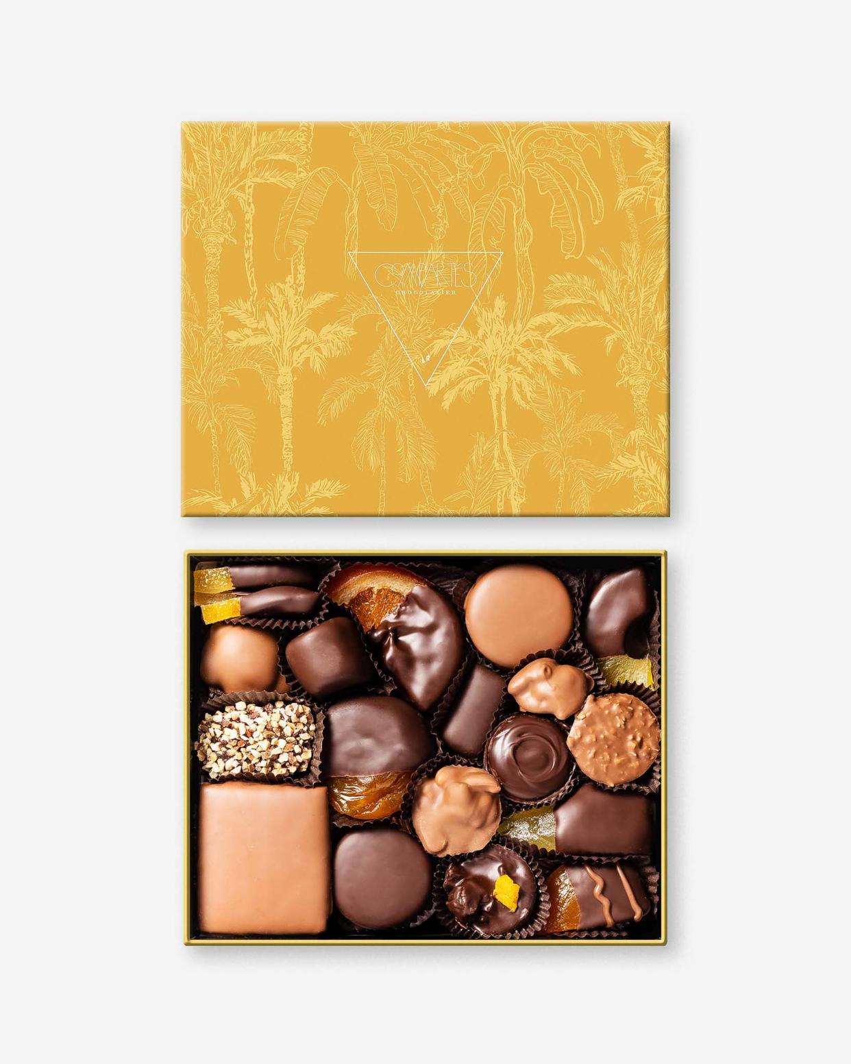 <p><a href="https://go.redirectingat.com?id=74968X1596630&url=https%3A%2F%2Fcompartes.com%2Fproducts%2Fassorted-gourmet-handmade-chocolates-gift-box-yellow&sref=https%3A%2F%2Fwww.veranda.com%2Fshopping%2Fg60361423%2Fgifts-for-mother-in-law%2F" rel="nofollow noopener" target="_blank" data-ylk="slk:Shop Now;elm:context_link;itc:0;sec:content-canvas" class="link rapid-noclick-resp">Shop Now</a></p><p>Assorted Gourmet Chocolates Gift Box</p><p>compartes.com</p><p>$74.95</p>