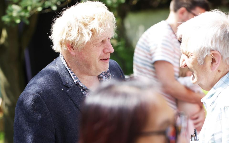 Boris Johnson at a church spring fair near his Oxfordshire country home - Ed Nix