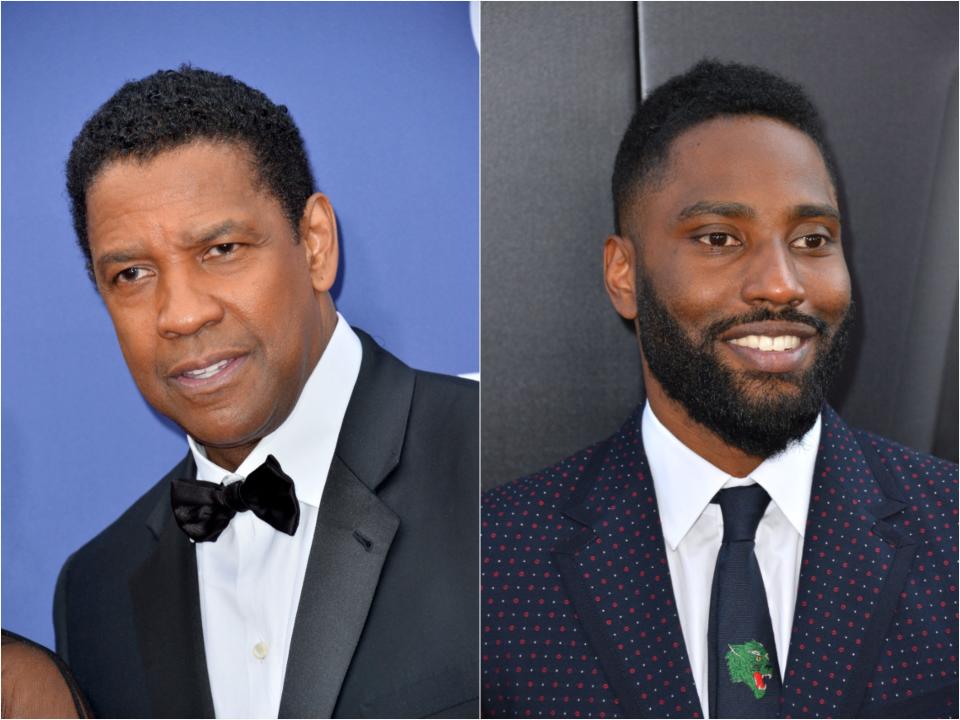 An older Denzel smiling with short hair and a younger John David smiling with short hair and facial hair.