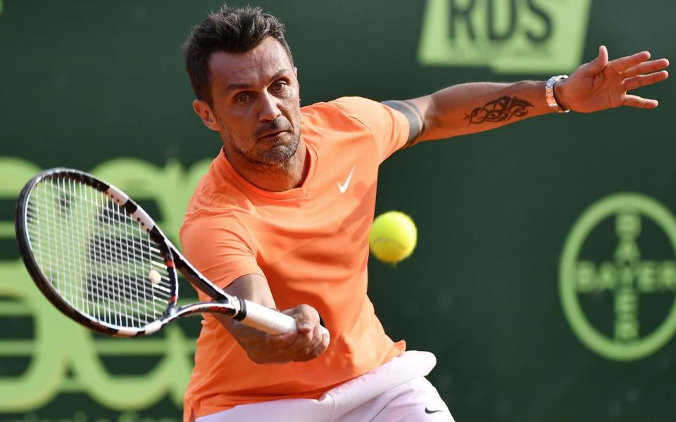 Paolo Maldini has made the jump from football to tennis - AFP