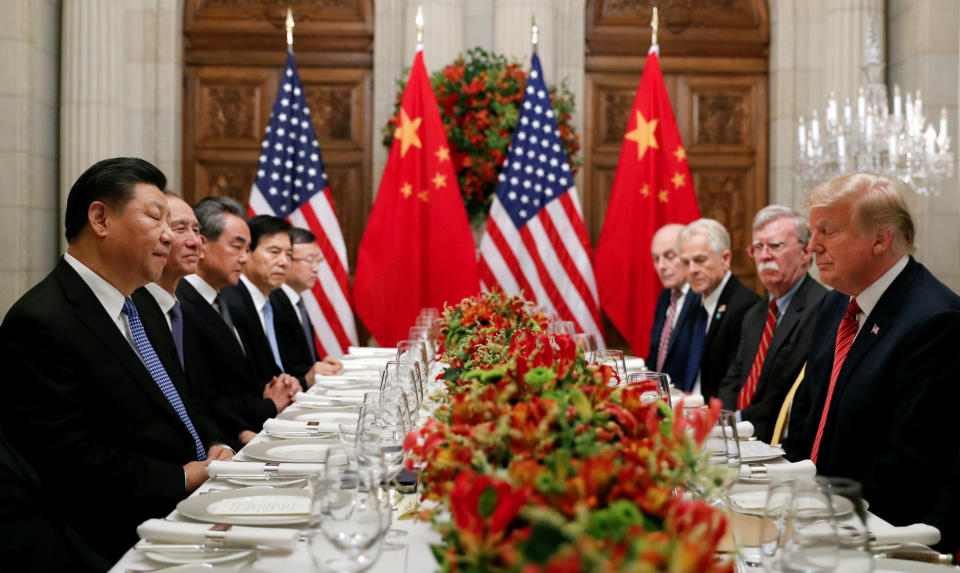 U.S. President Donald Trump, U.S. Secretary of State Mike Pompeo, U.S. President Donald Trump's national security adviser John Bolton and Chinese President Xi Jinping attend a working dinner after the G20 leaders summit in Buenos Aires, Argentina December 1, 2018. REUTERS/Kevin Lamarque     TPX IMAGES OF THE DAY