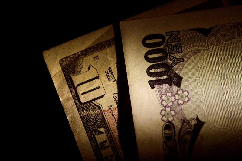 FILE PHOTO: Illustration photo of Japan Yen and U.S. Dollar notes