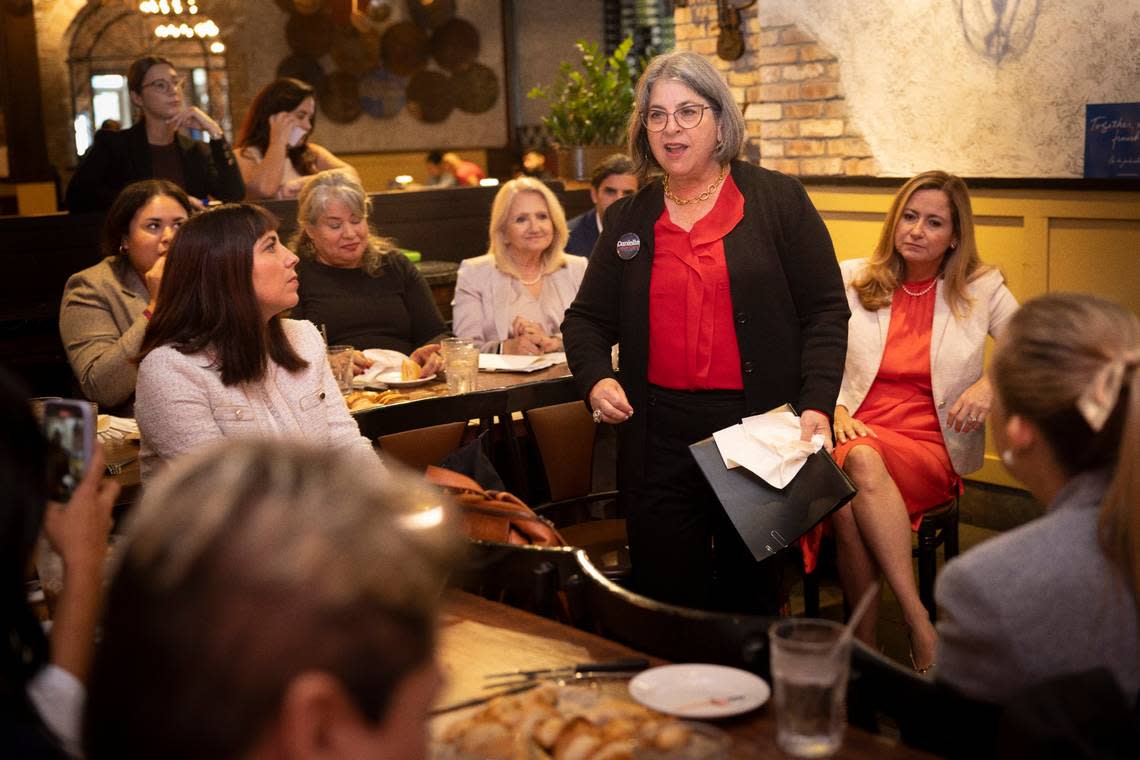 Mayor Daniella Levine Cava, center, speaks during a Democratic roundtable session held on Wednesday, Nov. 8, 2023, at Sergio’s in Doral. The Democrats were holding several events across Miami Wednesday as counterprogramming to the Republican presidential debate in Miami and the Trump rally in Hialeah, both happening Wednesday evening.