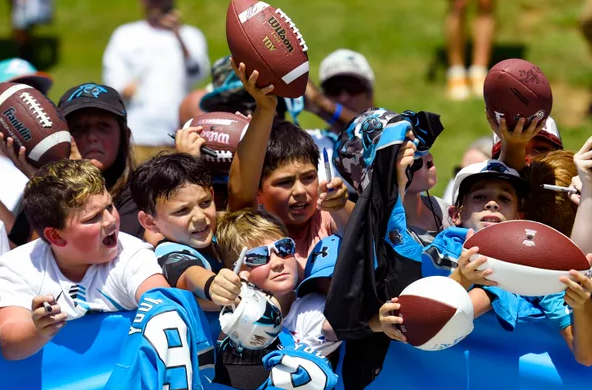 Fans seek autographs at the Panthers training camp at Wofford College, July 26, 2023.