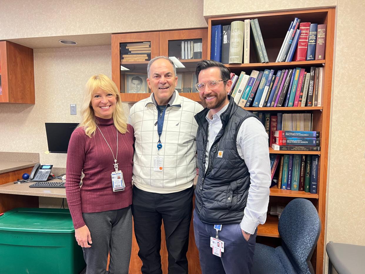 From left, Tamara Murray, Dr. Joseph Congeni and Dr. Matthew Smith at Akron Children's Hospital were involved in studying the effectiveness of cooling therapy to treat concussions.