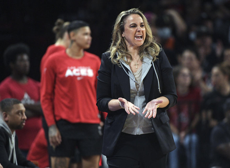 Las Vegas Aces head coach Becky Hammon directs her team during the first half of a WNBA basketball game against the Seattle Storm, Sunday, Aug. 14, 2022, in Las Vegas. (AP Photo/Sam Morris)