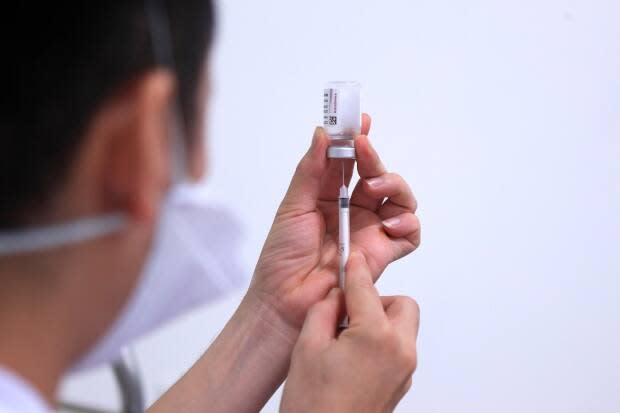 Thousands of first and second dose Pfizer and Moderna appointments are available across the province, Public Health says. (Hau Dinh/The Associated Press - image credit)