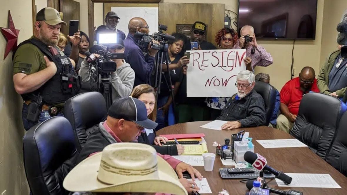 In this photo provided by the Southwest Ledger, people from Idabel, Oklahoma call for the resignation of several McCurtain County officials at a county commissioners meeting early Monday after tapes with the officials’ racist comments surfaced over the weekend. (Photo: Christopher Bryan/Southwest Ledger via AP)