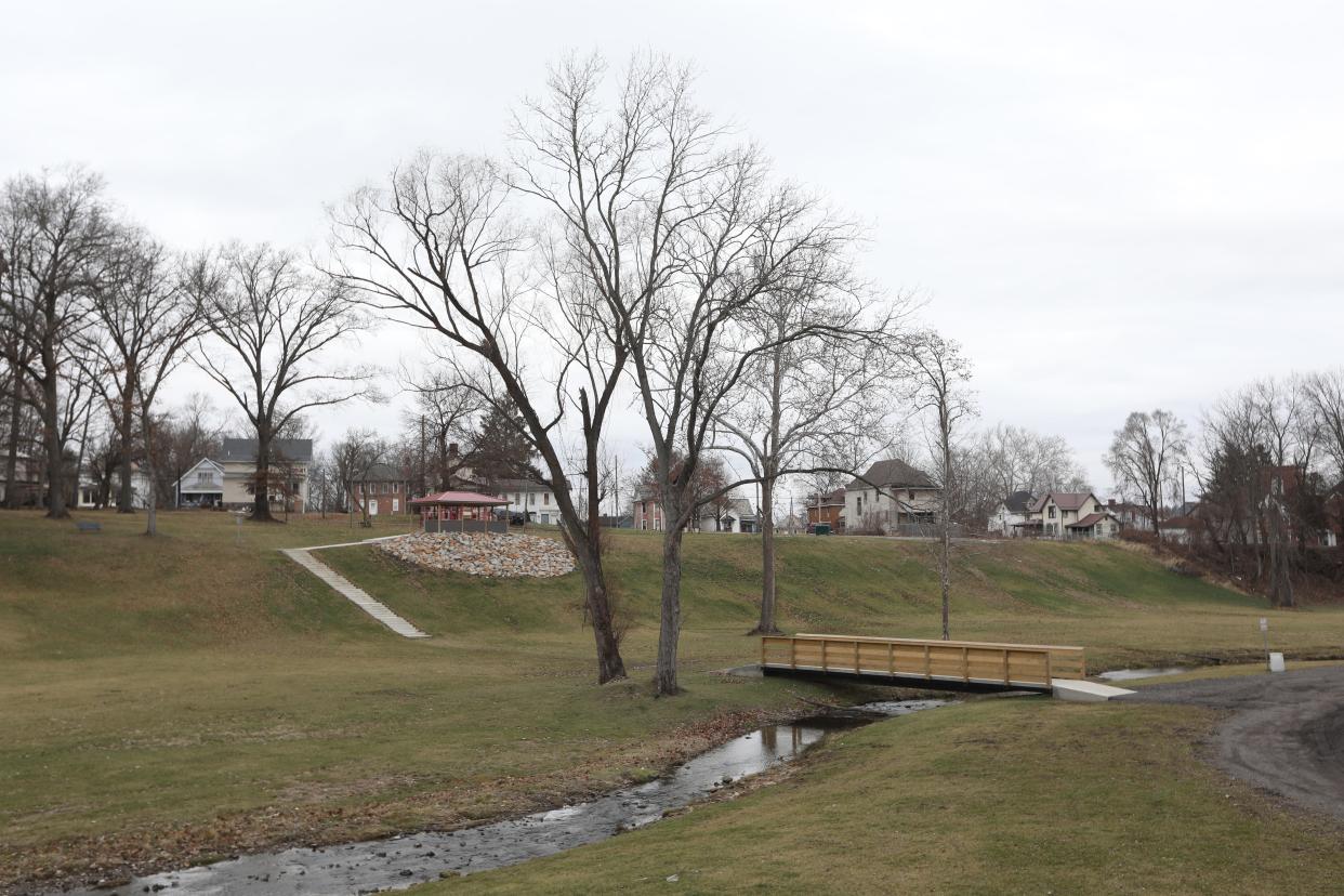 The transformation of Chaps Run Park in Zanesville was one of the highlights of the city's year. At left is the new sled hill, and stairs leading down to a new bridge built by city forces. Coming next year will be a concrete walking trail connecting the parks entrances.