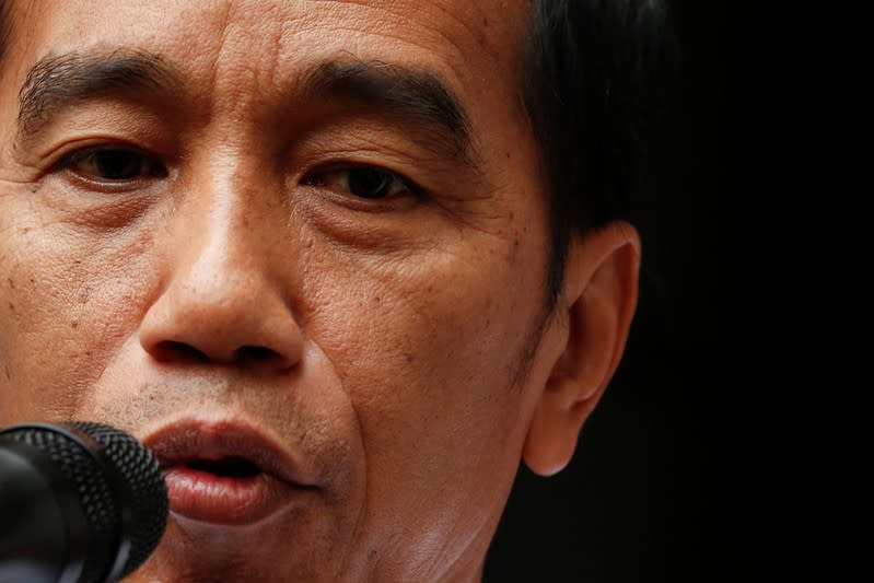 Indonesia's President Joko Widodo talks during a news conference at Gatot Subroto military hospital in Jakarta