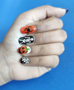 <p>Can't decide on pumpkins, spiderwebs, or skeletons? The good news is that you can have them all on your nails, as demonstrated by <a href="https://www.instagram.com/nailed.__.it/" rel="nofollow noopener" target="_blank" data-ylk="slk:freehand artist Kalyani K. Patil;elm:context_link;itc:0;sec:content-canvas" class="link ">freehand artist Kalyani K. Patil</a>. To paint these on your own fingers, you'll need a couple of thin nail brushes.</p><p><a class="link " href="https://go.redirectingat.com?id=74968X1596630&url=https%3A%2F%2Fwww.ulta.com%2Fnail-art-tool-kit%3FproductId%3DxlsImpprod5190147&sref=https%3A%2F%2Fwww.oprahdaily.com%2Fbeauty%2Fskin-makeup%2Fg33239588%2Fhalloween-nail-ideas%2F" rel="nofollow noopener" target="_blank" data-ylk="slk:SHOP NAIL TOOL KIT;elm:context_link;itc:0;sec:content-canvas">SHOP NAIL TOOL KIT</a></p>