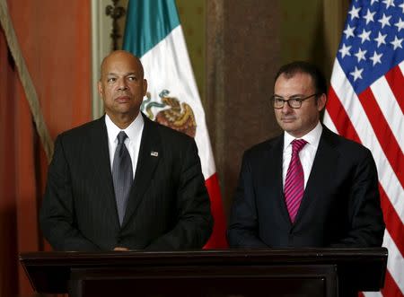 U.S. Department of Homeland Security (DHS) Secretary Jeh Johnson (L) and Mexico's Finance Minister Luis Videgaray wait before they announce a program of pre-inspection border stations during a news conference in Mexico City, Mexico October 15, 2015. REUTERS/Henry Romero