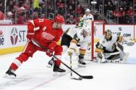 Feb 7, 2019; Detroit, MI, USA; Detroit Red Wings center Dylan Larkin (71) as Vegas Golden Knights defenseman Brayden McNabb (3) defends during the third period at Little Caesars Arena. Mandatory Credit: Tim Fuller-USA TODAY Sports