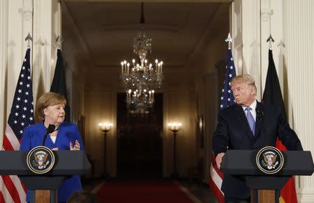 U.S. President Donald Trump and Germany's Chancellor Angela Merkel hold a joint news conference in the East Room of the White House in Washington, U.S., April 27, 2018. REUTERS/Kevin Lamarque