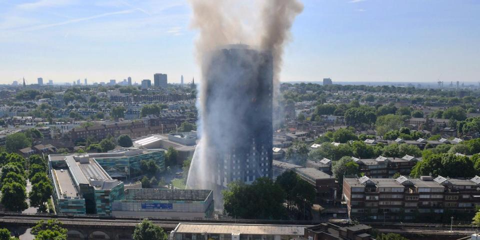 Smoke billows from a fire that has engulfed the 24-storey Grenfell Tower in west London.