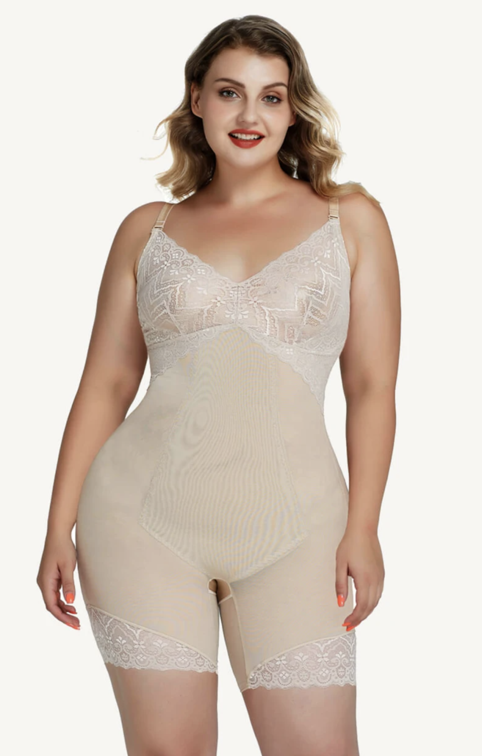 plus size model wearing a lace bodysuit in beige for underneath a wedding dress