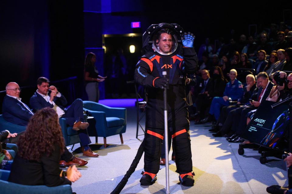 TOPSHOT - Chief Engineer Jim Stein wears the new spacesuit during the Axiom Space Artemis III Lunar Spacesuit event at Space Center Houston in Houston, Texas, on March 15, 2023. - 