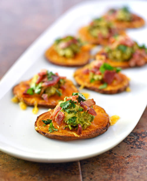 <strong>Get the <a href="http://www.wellplated.com/sweet-potato-bites/" target="_blank">Sweet Potato Bites with Avocado and Bacon recipe</a>&nbsp;from&nbsp;Well Plated By Erin</strong>