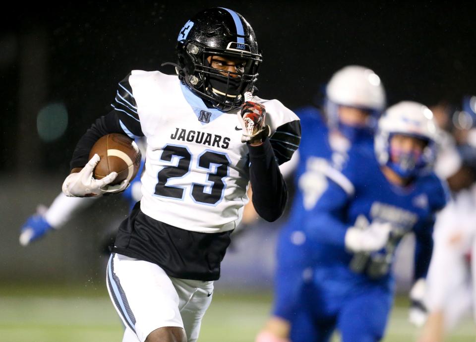 Northridge defensive back Travaris Banks (23) runs the ball against County High Friday, Oct. 29, 2021, at Tuscaloosa County High School. [Staff Photo/Gary Cosby Jr.]