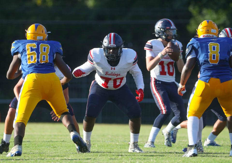 First State Military Academy's Levi Martineau drops back in pass protection in the Bulldogs' 55-0 win at A.I. du Pont last Friday. Kevin Tresolini is picking the Bulldogs to win again on Saturday at Charter of Wilmington, while Brad Myers and Matt Kalin are going with the home team.