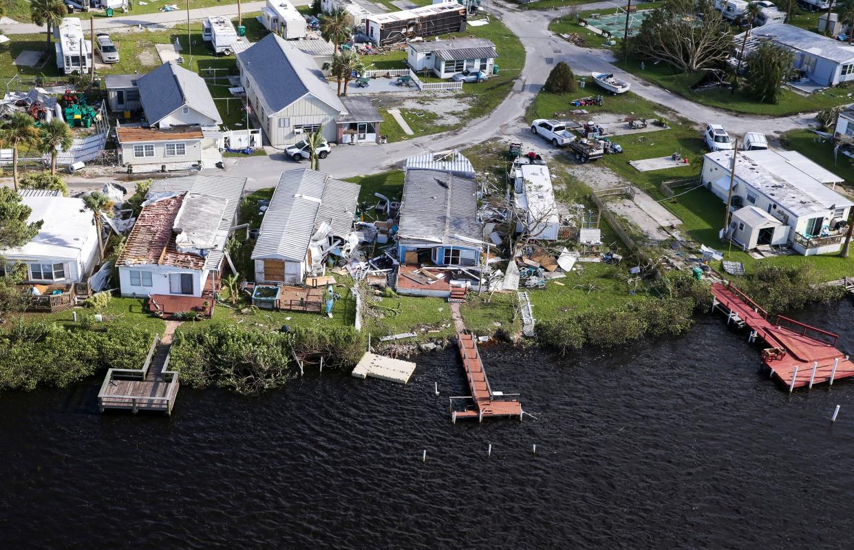 Damage to homes after Hurricane Ian, Thursday, Sept. 29, 2022, in Punta Gorda, Fla.