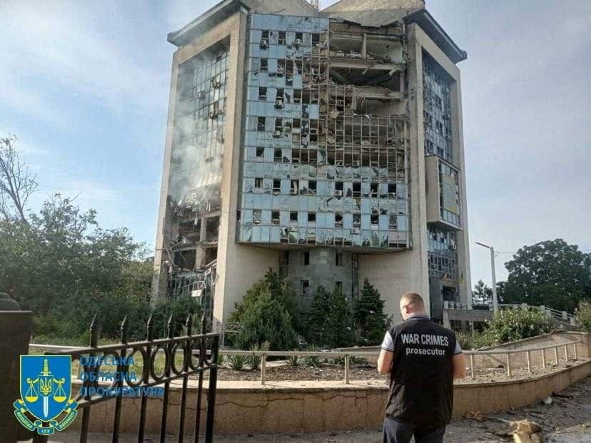 An inspector surveys the damage at a grain port facility after a reported attack by Russian military drones in the Odesa region (via REUTERS)