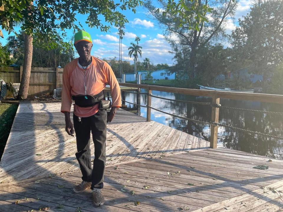 Willie Sirmons, 74, stands on the deck behind his River Park home in the city of Naples, Florida on Saturday, Oct. 1, 2022. Sirmons and his wife were trapped in their house during a storm surge caused by Hurricane Ian on Wednesday, Sept. 28.