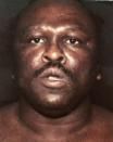 <p>The former heavyweight champion was arrested in 1999 after he was convicted of an attack on his former fiance. Dokes was given a 4-15 year prison sentence. (Photo credit: Law Enforcement) </p>