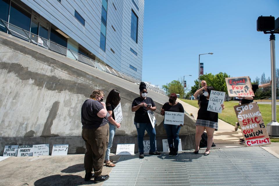 Members of the SPLC Union protest unfair working conditions outside the Souther Poverty Law Center headquarters in Montgomery, Ala., on Monday, March 28, 2022.