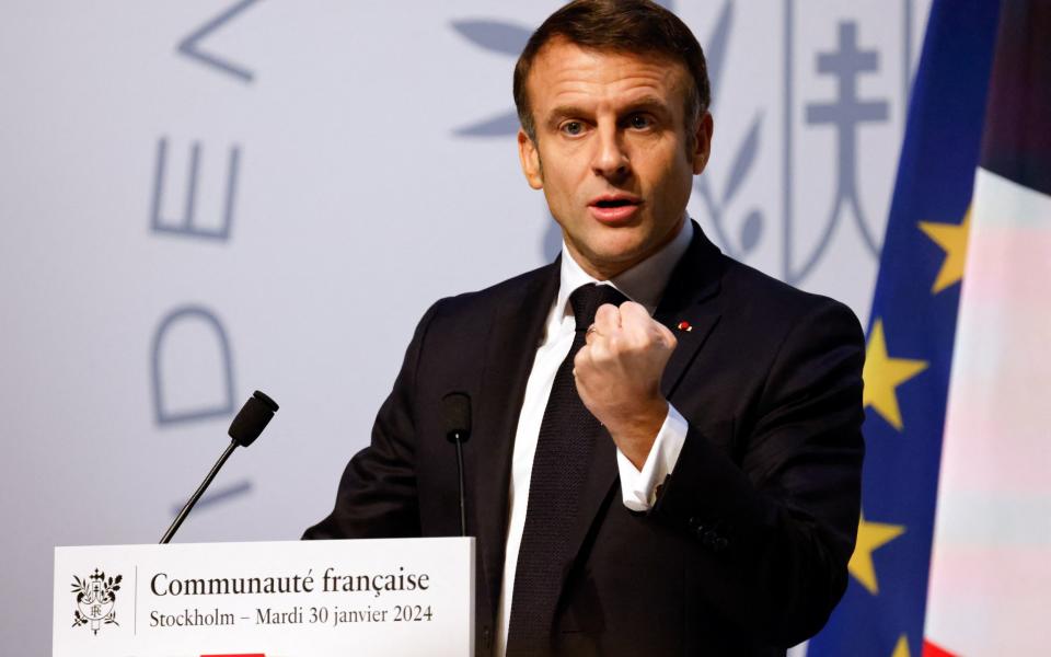 Emmanuel Macron photographed in Stockholm speaking to French expats living in Sweden