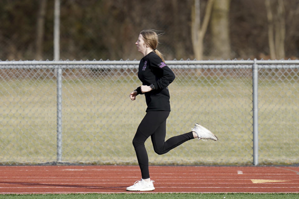 East Palestine High School senior Mia Lee trains for track, Monday, March 6, 2023, in East Palestine, Ohio. Athletes are navigating spring sports following the Feb. 3 Norfolk Southern freight train derailment. (AP Photo/Matt Freed)