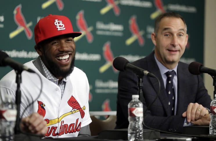 Dexter Fowler (left) may not be last on Cardinals general manager John Mozeliak's (right) wishlist. (AP)