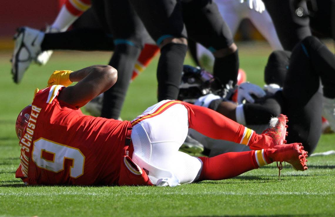 Chiefs wide receiver JuJu Smith-Schuster stayed down on the turf after being hit hard by Jacksonville Jaguars safety Andre Cisco during Sunday’s game at GEHA Field at Arrowhead Stadium.