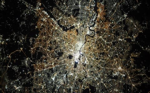 Jessica Meir, an astronaut on board the International Space Station, captured a spectacular photo of London from above - Credit: Cover Images