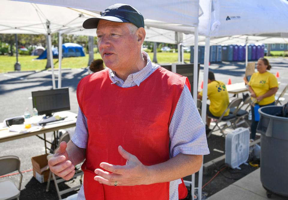 Mike Dohm works in the staging area for the Crisis Cleanup program from the Church of Jesus Christ of Latter-day Saints, in Naples, Fla., on Saturday, Oct. 8, 2022. Hurricane Ian hit the southwest Florida coast on Sept. 28.