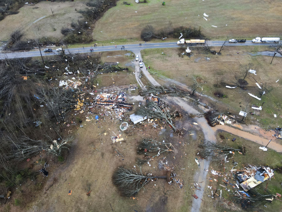 Devastation is seen in the aftermath from severe weather, Thursday, Jan. 12, 2023, in Greensboro, Ala. A giant, swirling storm system billowing across the South spurred a tornado on Thursday that shredded the walls of homes, toppled roofs and uprooted trees. (Mike Goodall via AP)