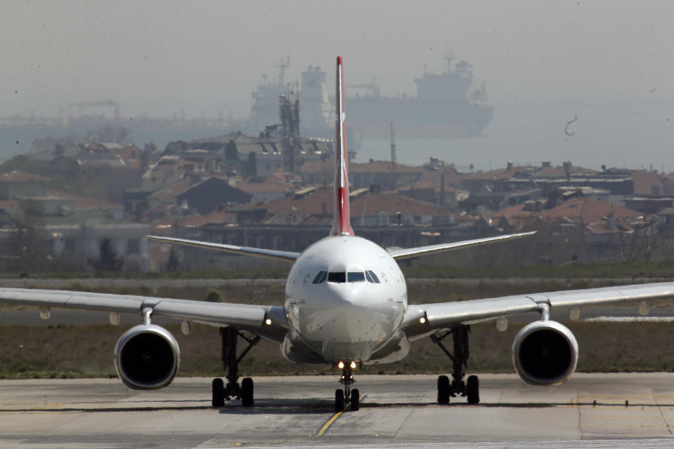 A Turkish Airlines airplane at Ataturk International Airport, in Istanbul, Friday, April 5, 2019, ahead of its closure. The relocation from Ataturk International Airport to Istanbul Airport on the Black Sea shores— dubbed the "Great Move"—began early Friday and is expected to end Saturday. Ataturk Airport, ranked 17th busiest in the world in 2018 according to preliminary statistics, will cease commercial operations at 02:00 am local Saturday (2300 GMT Friday.) (AP Photo/Lefteris Pitarakis)