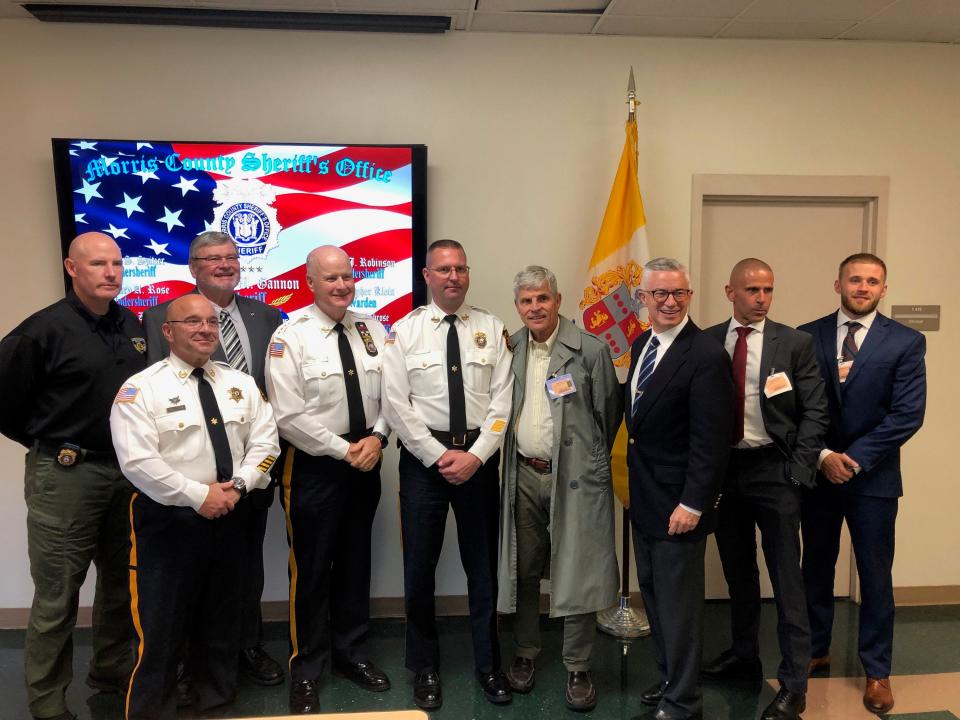 Jim McGreevey, third from right, chairman and executive director of the New Jersey Reentry Corporation and former New Jersey governor, meets with Morris County law enforcement officials to announce a partnership between the sheriff's office and the NJRC at the county correctional facility in Morristown Monday, Sept. 18, 2023.